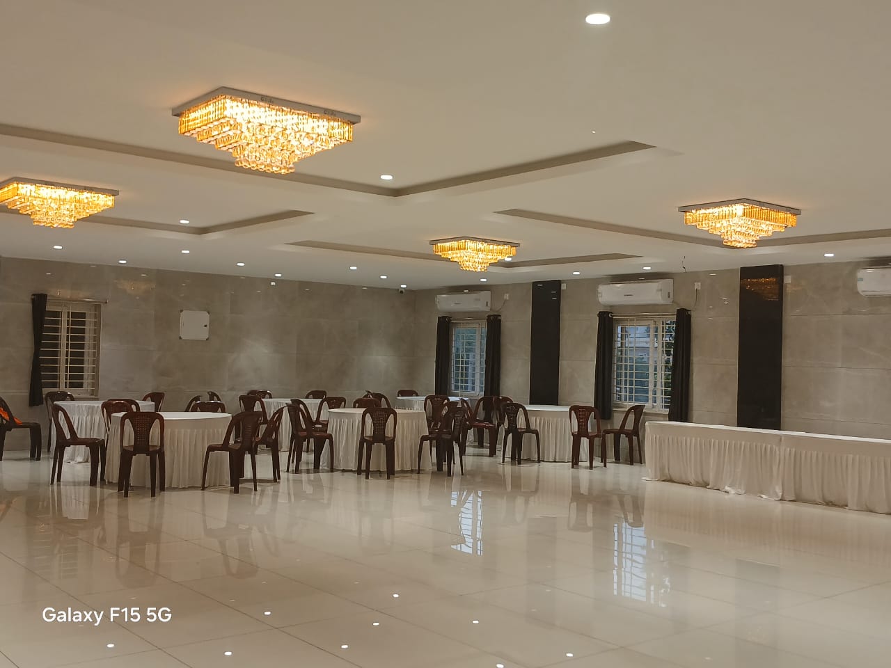 Air conditioned banquet hall with crystal chandeliers