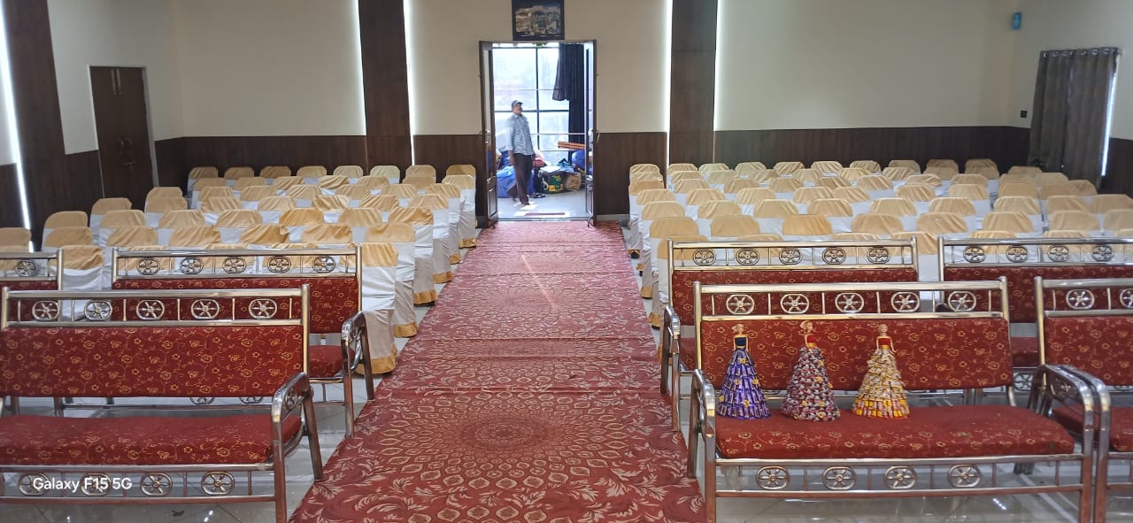 Comfortable seating rows arranged with a red aisle carpet